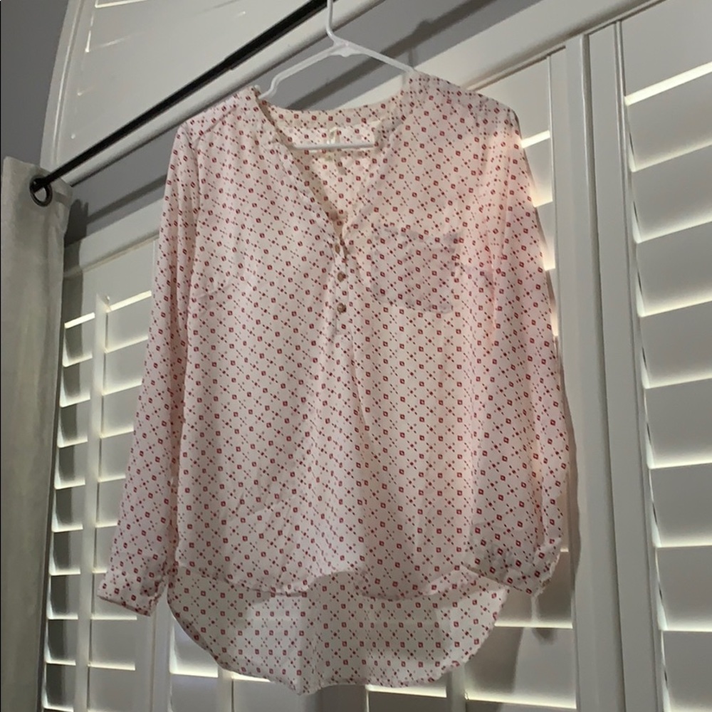 White top with small pink flowers